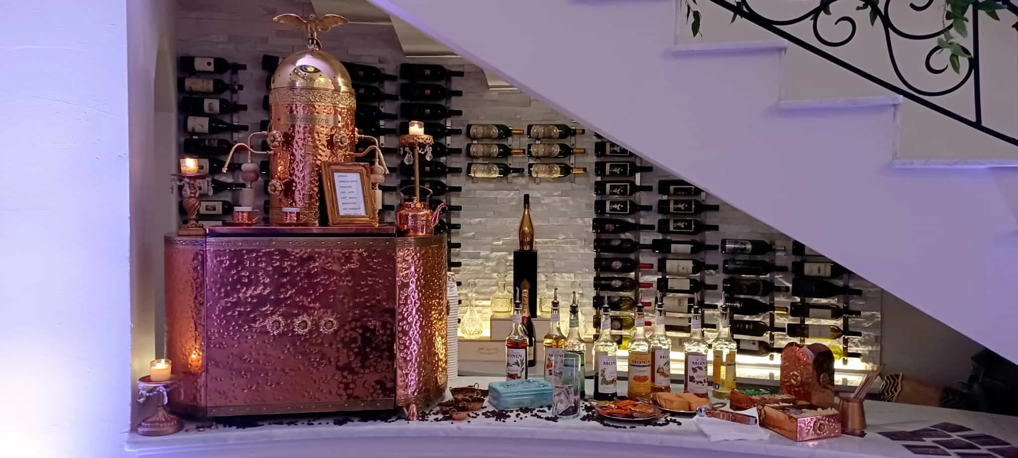 Copper coffee bar glowing at a wedding venue